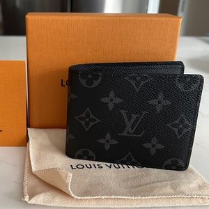 Louis Vuitton slender eclipse monogram wallet